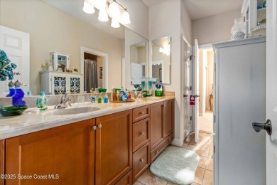 Discover timeless charm in this custom-built lakefront home