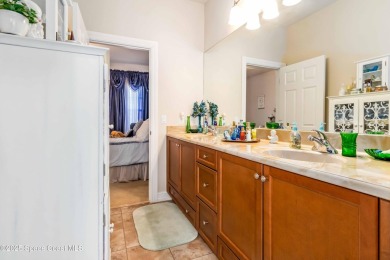 Discover timeless charm in this custom-built lakefront home