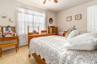 Discover timeless charm in this custom-built lakefront home