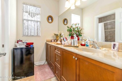 Discover timeless charm in this custom-built lakefront home