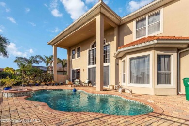 Discover timeless charm in this custom-built lakefront home