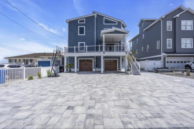 Discover waterfront living at its finest in this brand-new