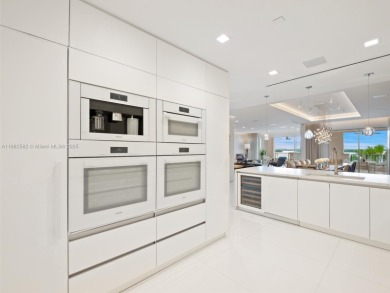 Live the Fisher Island lifestyle in this completely renovated