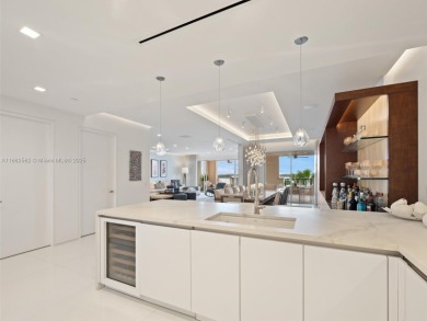 Live the Fisher Island lifestyle in this completely renovated