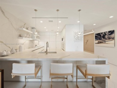 Live the Fisher Island lifestyle in this completely renovated