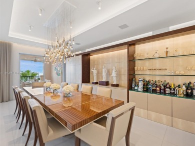Live the Fisher Island lifestyle in this completely renovated