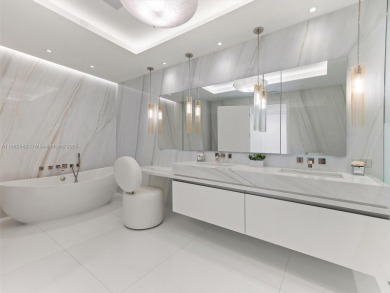 Live the Fisher Island lifestyle in this completely renovated