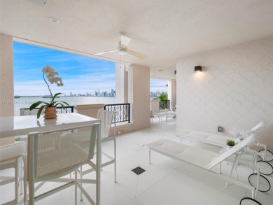 Live the Fisher Island lifestyle in this completely renovated