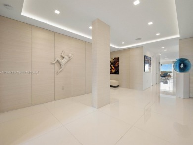 Live the Fisher Island lifestyle in this completely renovated