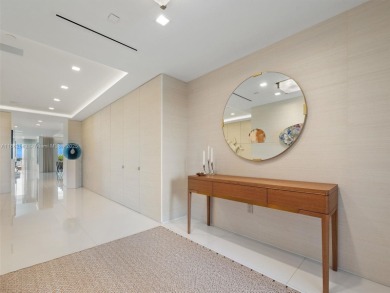 Live the Fisher Island lifestyle in this completely renovated