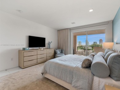 Live the Fisher Island lifestyle in this completely renovated