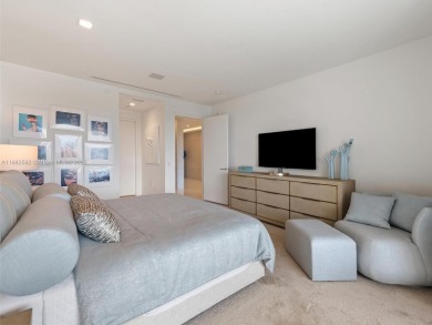 Live the Fisher Island lifestyle in this completely renovated