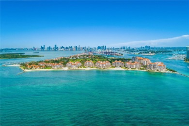 Live the Fisher Island lifestyle in this completely renovated