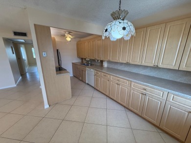 Welcome to this 2-bedroom, 1.5-bath, 1008 sq ft condo in the