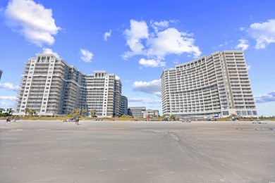 Wake up to the sound of waves and endless ocean views from this