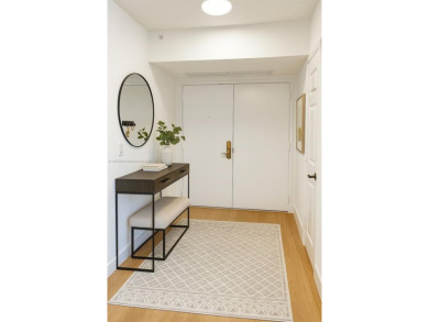 Experience oceanfront living at its finest in this bright and