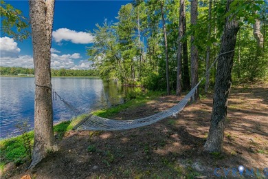AMAZING LAKEFRONT ONE STORY HOME IN BEAUTIFUL LAKE CAROLINE !
