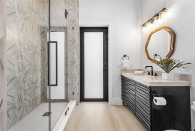 Welcome to 101 feet of direct waterfront on a private road in