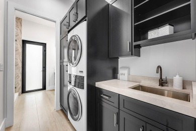 Welcome to 101 feet of direct waterfront on a private road in