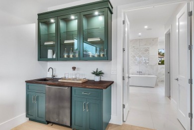 Welcome to 101 feet of direct waterfront on a private road in