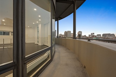 This three-story penthouse at 600 N Kingsbury is a rare