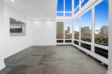 This three-story penthouse at 600 N Kingsbury is a rare