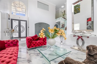 Welcome Home! Situated in the prestigious gated community of