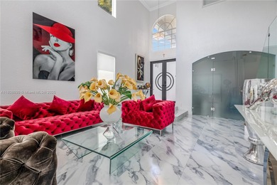 Welcome Home! Situated in the prestigious gated community of