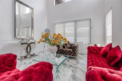 Welcome Home! Situated in the prestigious gated community of