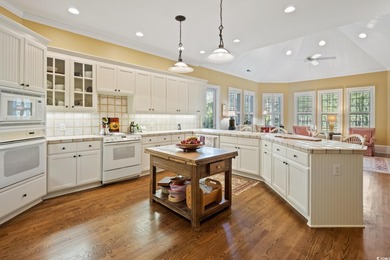 Welcome to 14 Cotillion Court, a beautifully designed raised