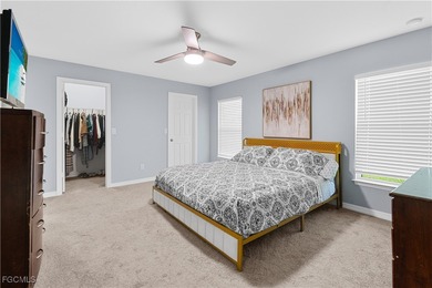 Welcome to this beautifully maintained 4-bedroom, 2-bath