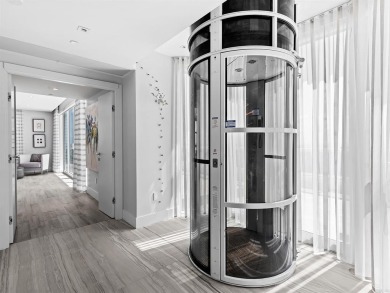 Rarely available distinctive two-story penthouse at desirable