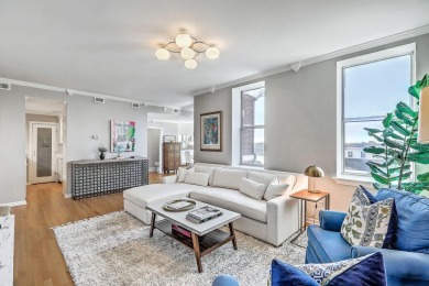 Move-in ready, tastefully updated 2-story, top floor unit in the