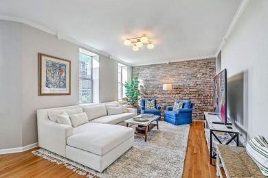 Move-in ready, tastefully updated 2-story, top floor unit in the