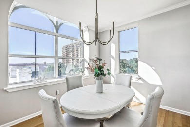 Move-in ready, tastefully updated 2-story, top floor unit in the