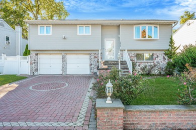 Welcome to 2864 Eastern Blvd, a spacious 6-bedroom, 4-bath hi