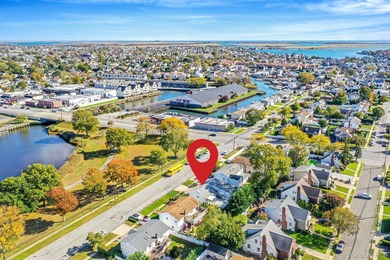 Welcome to 2864 Eastern Blvd, a spacious 6-bedroom, 4-bath hi