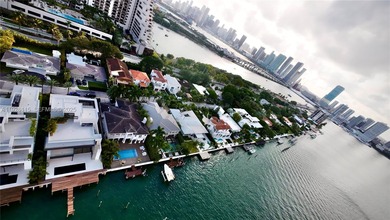 A commanding trophy estate on the open bay within the ultra