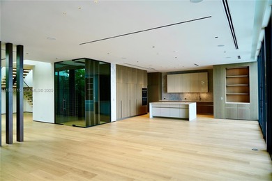 A commanding trophy estate on the open bay within the ultra