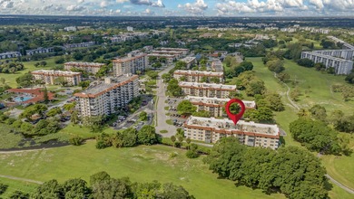 Stunning 2BD/2BA residence with panoramic views in a secure