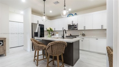 Exceptional Upgraded Corner Townhome in Downtown Doral. Step