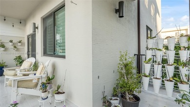 Exceptional Upgraded Corner Townhome in Downtown Doral. Step