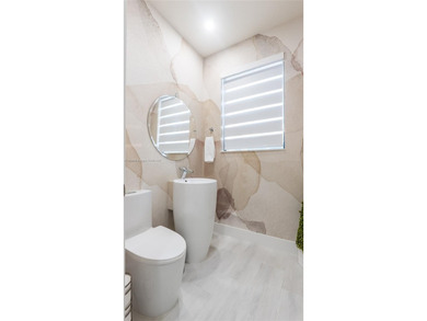 Exceptional Upgraded Corner Townhome in Downtown Doral. Step