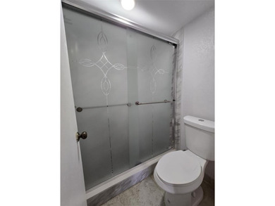 Step into this spacious 2-bedroom, 2-bathroom,  one of the