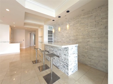 Experience true Miami living in this stunning 2-bedroom