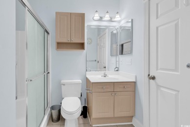 This furnished 3-bedroom, 2-bath condo offers beach living at