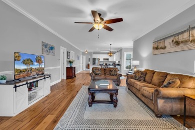 This furnished 3-bedroom, 2-bath condo offers beach living at