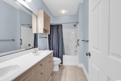 This furnished 3-bedroom, 2-bath condo offers beach living at