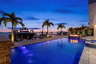 Welcome to an extraordinary waterfront residence in the highly