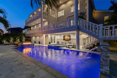 Welcome to an extraordinary waterfront residence in the highly